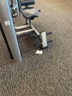 Used Paper towels discarded throughout the gym