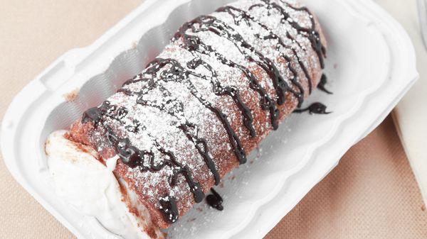 Dessert Dog: Crispy Cinnamon Sugar Roll, Cannoli Cream Stuffing, Chocolate Sauce, & Powdered Sugar