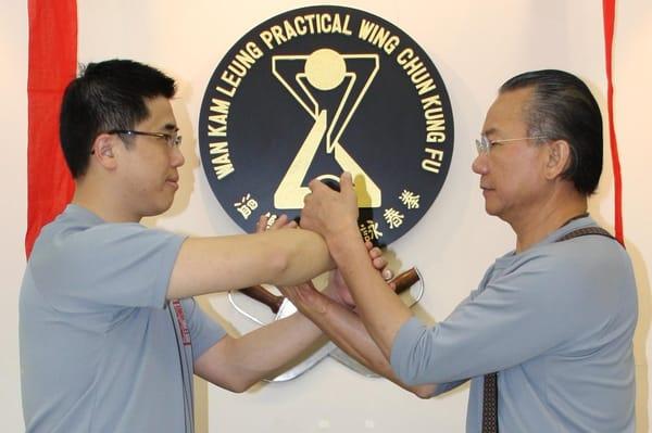 Grandmaster Wan Kam Leung and Master Kwok