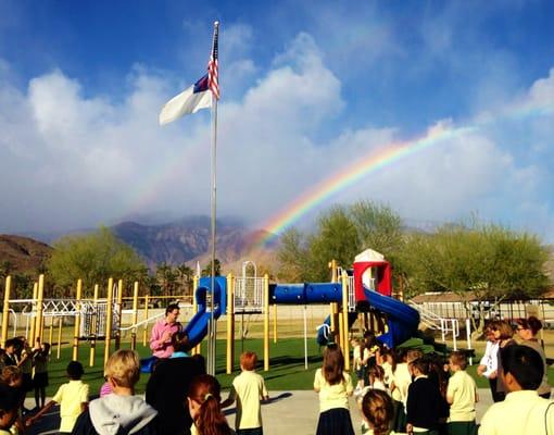 Daily gathering around the flag pole for Pledge of Allegiance