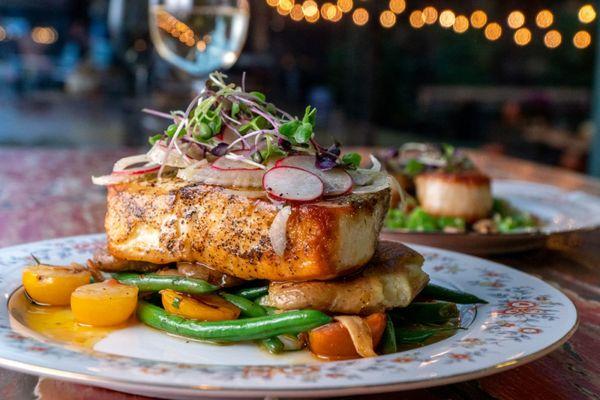 Pan Seared Halibut with roasted potatoes, heirloom tomatoes, haricot vert, salsa verde, fennel & radish salad