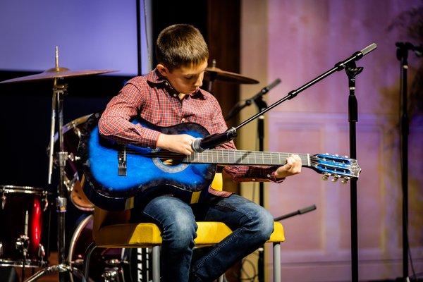 A Music Junction student recital performance with a super cool guitar!