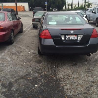 Then there's THIS asshole in two spots. Sign in window says "Student Driver."