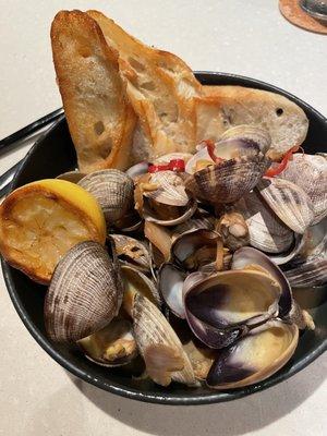 Manila Clam Steamers Manila Clams Steamed in Sake-Shoyu, Finished with Cilantro and Fresno Peppers. Served with Grilled Crostini