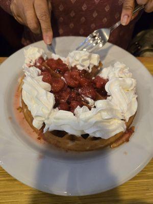 Waffle with strawberries and whipp cream