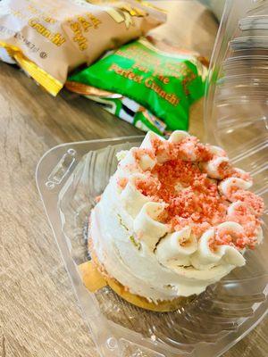 Strawberry Shortcake mini cake with chips in the background. Waiting on my egg salad sandwich on squaw bread.