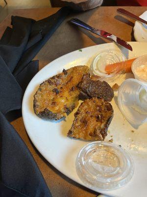 This is a picture of the potato skins we were served as part of a combo platter. T