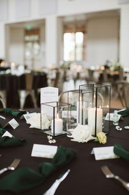 Black table linens and dark green napkins to match our minimal, industrial theme!