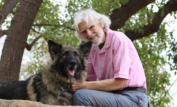 Dr. Good loves dogs, as you can see him with Charlie, his Shilo Shepard