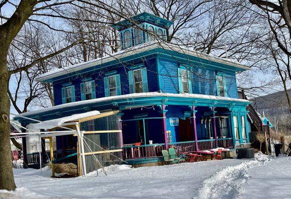 Roots restaurant on both floors, bar first floor, and outside in season.