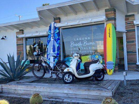 13 E Bikes, 6 Mopeds, surfboards, Paddle boards and all your beach supplies!