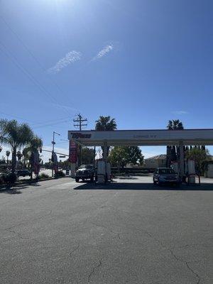 How clean the gas station looks after, some homeless guy picks up trash.