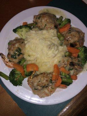 Stuffed shrimp scampi with crab meat and mashed potatoes