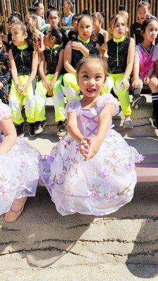 My youngest daughter waiting patiently for her class to showcase their ballet dance at Knott's Berry Farm.