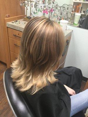 Layered cut, removed home hair color and replaced with highlight/lowlight/toner