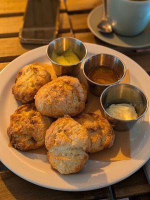 Creme fraiche scones, salted butter, kumquat marmalade, lemon curd