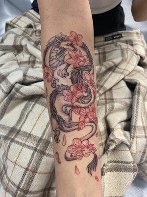 Dragon with red blossoms, done by arrow Nicole