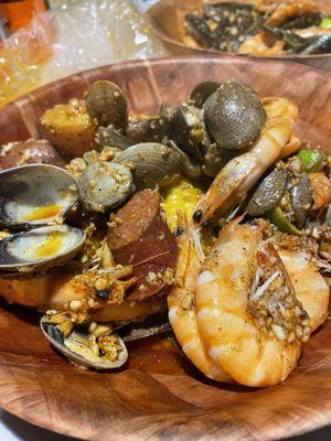 Shrimp, clams, sausage, potatoes, corn - mild cajun mix