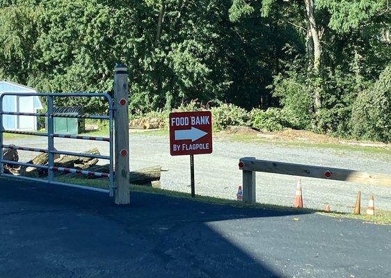 Near the church, follow the signs to find the food bank.