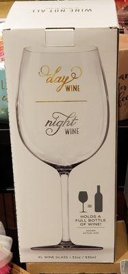 A wine glass that holds a full bottle of wine: "Day Wine --- Night Wine"