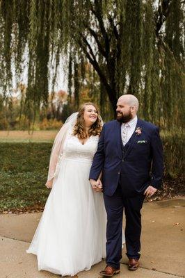 Couple out back by the weeping willow
 
  Brandilynn Photography