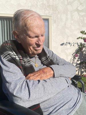 Dad enjoying the sun on the beautiful patio