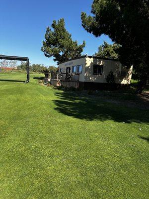 Cool Clubs building located on the all grass driving range