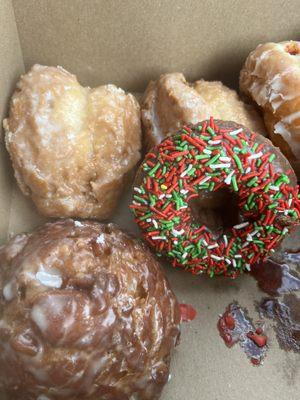 Buttermilk, chocolate sprinkles, apple fritter, and raspberry filled