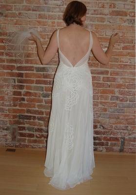 Great dress for a great price (before the fitting which made the back sheer netting sit properly)