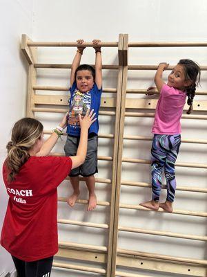 Kids doing gymnastics