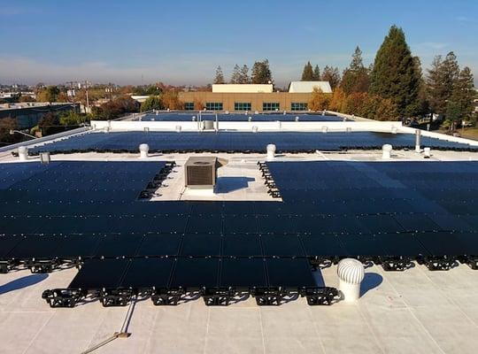 JP Graphics roof with solar panels. We're green certified!