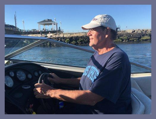 Here I am (Dr. Jim) bringing our boat back in from the ocean. Thank you Monmouth Marine Engines for keeping her running soundly!