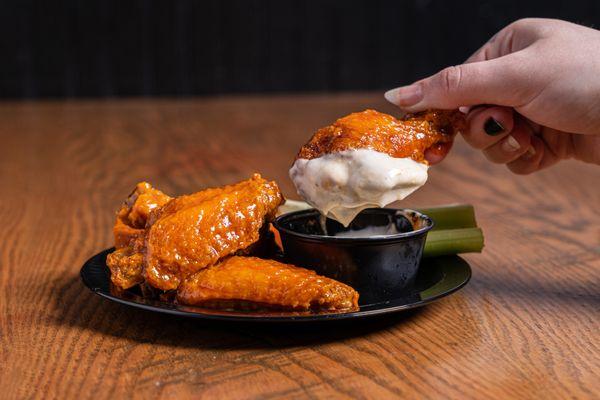 Our world famous wings dipped in our house bleu cheese.