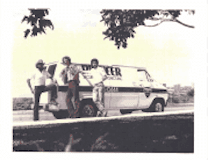 Pioneer Security's first vehicle and first employees, circa 1978.