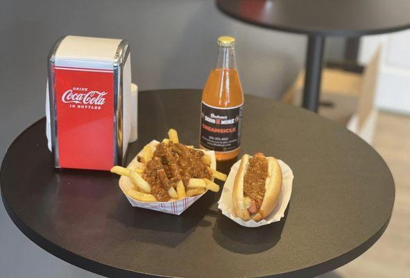 Chili cheese fries,  a chili dog and a  boulevard dog -n- more creamsicle pop!