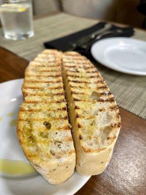 Warm bread with oil and I forgot what they add to this bread is delicious.  One bread is missing my son grabbed it before I snapped the pic