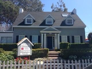 This historic home in Del Mar Village is now the home for Lutz Insurance Services.  Reserved parking located behind the building