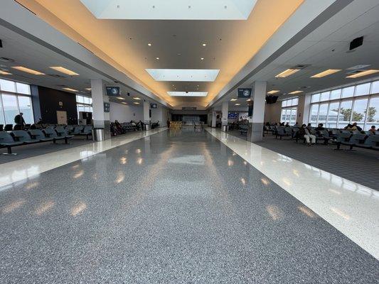 Waiting area with 3 gates surrounding.