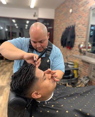 Our apprentice Ramiro always delivering great haircuts for half the price.