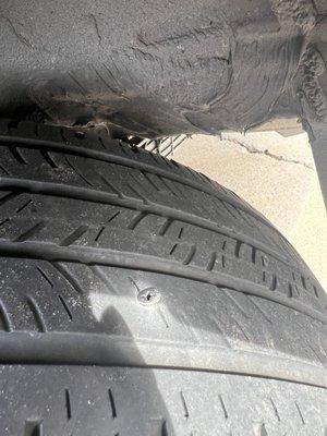 Screw in tire. They repaired it for me.