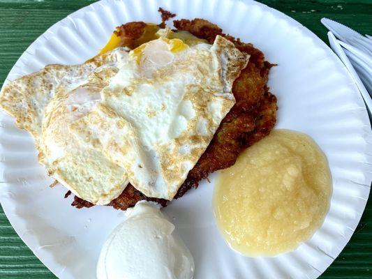 Polish breakfast. Two potato pancakes and two eggs.