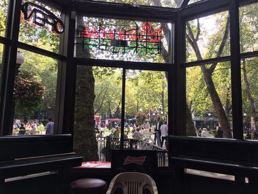 Glass-enclosed front seating area looks out onto Pioneer Square.