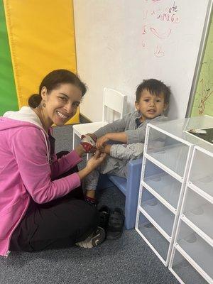 Cassius with his OT therapist Jenny