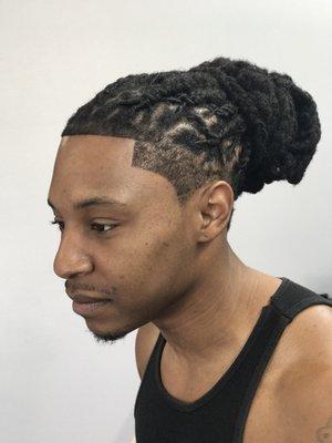 Dreadlock re-twist in style