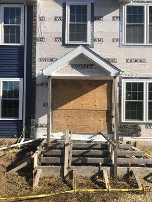 Another pic of front of home, TYVEK wrapped for over a year! The wood is 'seasoned' its been so long exposed.