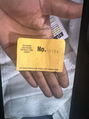 the ticket number given by Ceddy worker indica (short and wear glasses and caked up teeth at the bottom)