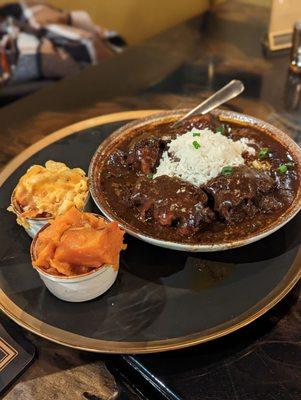 Oxtails, Hennessey yams, and Mac and cheese which all somehow tasted less flavorful than store bought/box versions the same name