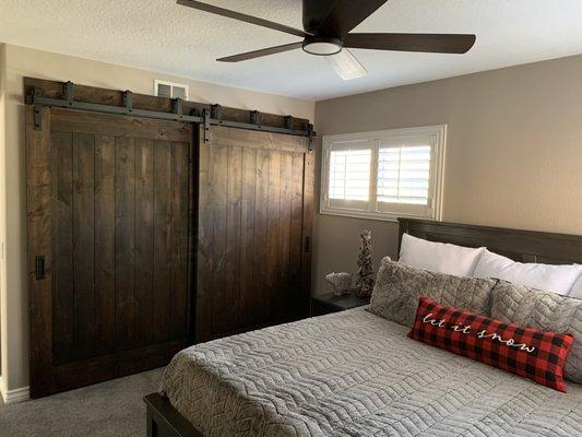 Guest bedroom bypass barn doors. Knotty Alder with Espresso stain.