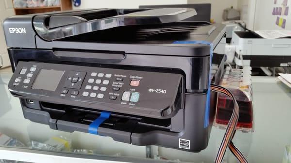 Epson con sistema de tinta instalado