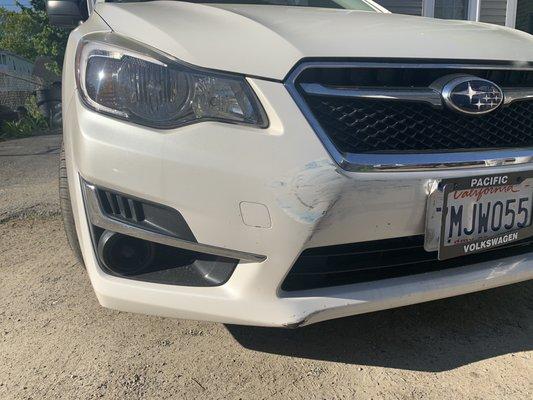 Blue car hit front bumper passenger side